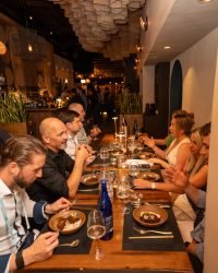 Guests enjoying a private dining event at Kayao restaurant in Old Town Chicago